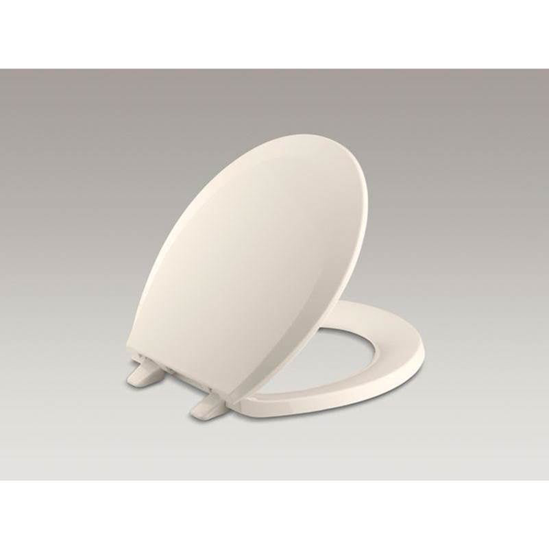 Kohler - LustraE Quick-ReleaseE round-front toilet seat - Innocent Blush