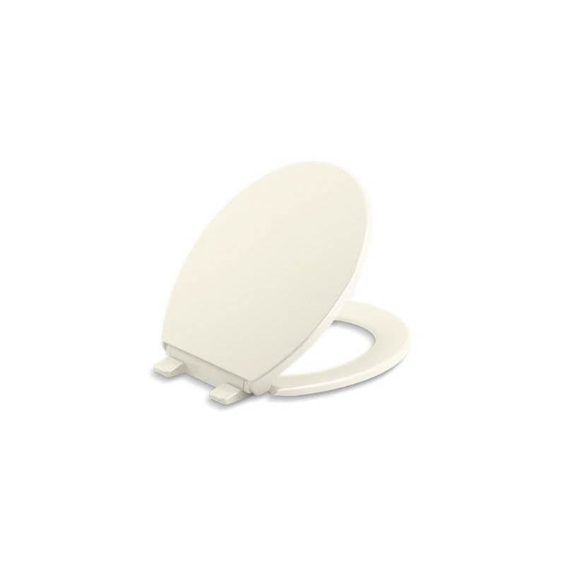 Kohler - BreviaE Quiet-CloseE round-front toilet seat - Biscuit