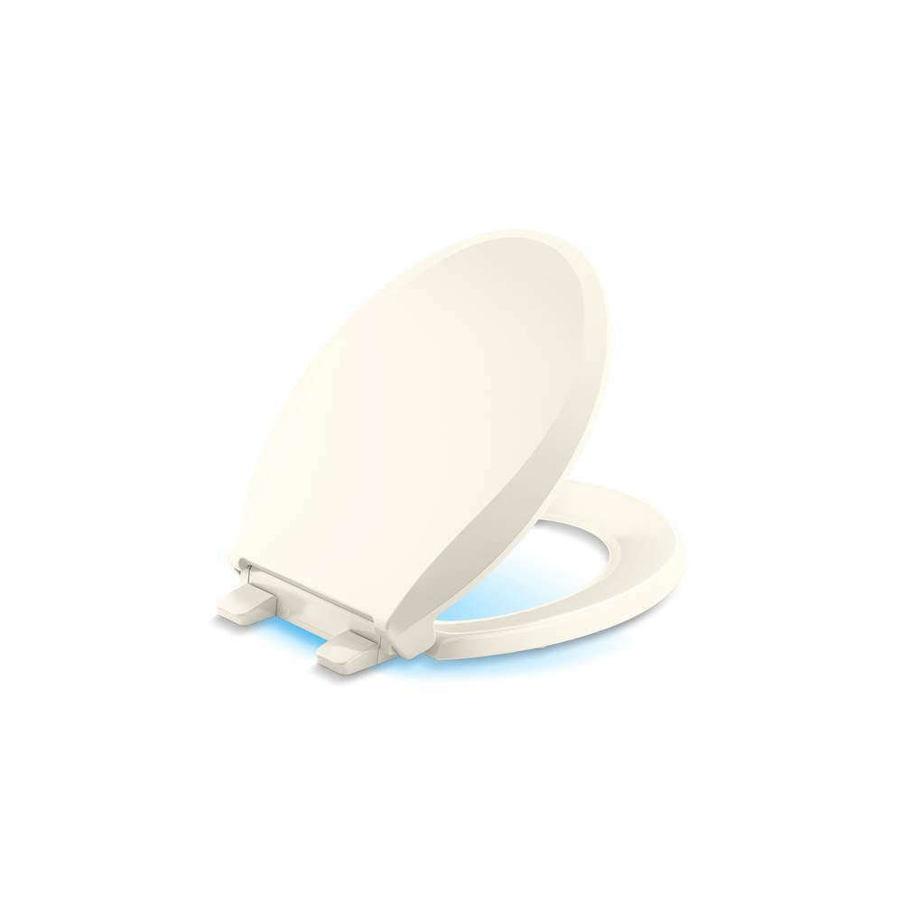 Kohler - Cachet Nightlight ReadyLatch Quiet-CloseE round-front toilet seat - Biscuit