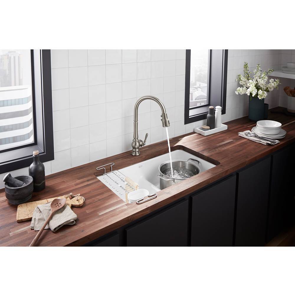 Artifacts Touchless pull-down kitchen sink faucet with three-function sprayhead