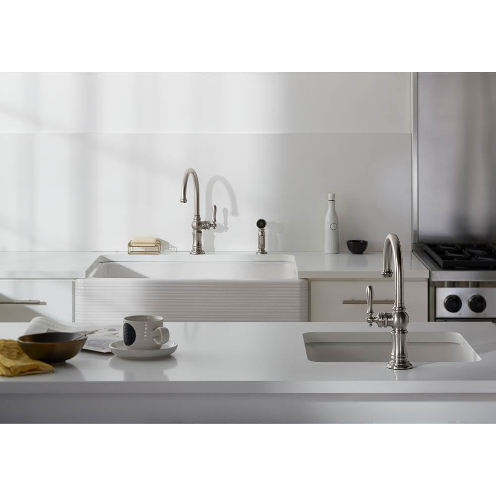Artifacts Single-handle kitchen sink faucet with two-function sprayhead