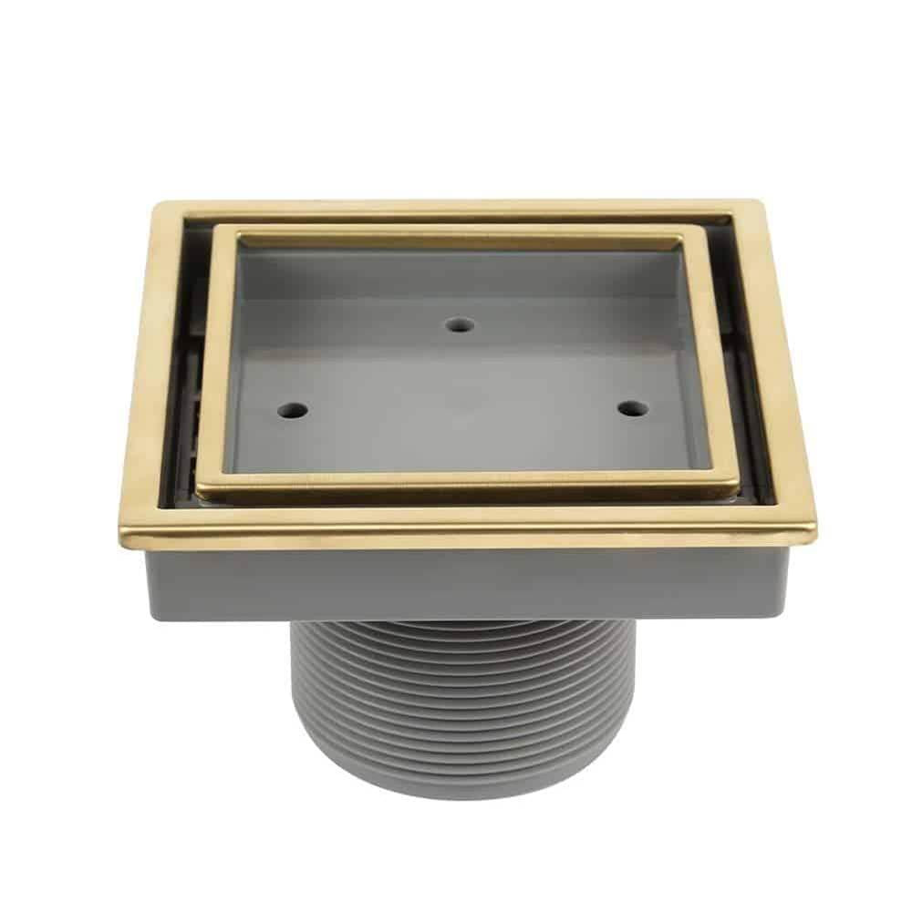 QM Drain - Lagos Series. Veil Line. 4'' Square Drain. Gold - Gold
