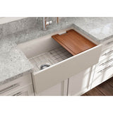 Contempo Step-Rim Apron Front Fireclay 30 in. Single Bowl Kitchen Sink with Integrated Work Station & Accessories in White