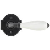 Bouvet - Knob on rosette set - Complete tubular passage set for 1 3/4'' door - Blue Porcelaine / Rust 099