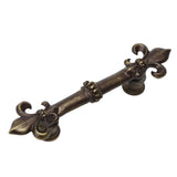 Carpe Diem Hardware - Charlemagne 3'' O.C. Pull With Large Fleur De Lys In Antique Brass. - Antique Brass