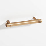 Colonial Bronze - 8'' center-to-center, 9'' overall, 0.46875'' diameter Round, grooved Cabinet Pull with tapered posts hand finished in Polished Bronze and Polished Bronze - Polished Bronze,Polished Bronze