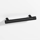 Colonial Bronze - 4'' center-to-center, 5'' overall, 0.46875'' diameter Round, grooved Cabinet Pull with tapered posts hand finished in Matte Satin Black and Matte Satin Black - Matte Satin Black,Matte Satin Black