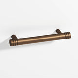 Colonial Bronze - 3.5'' center-to-center, 4.5'' overall, 0.46875'' diameter Round, grooved Cabinet Pull with tapered posts hand finished in Matte Oil Rubbed Bronze and Matte Oil Rubbed Bronze - Matte Oil Rubbed Bronze,Matte Oil Rubbed Bronze