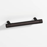 Colonial Bronze - 3.5'' center-to-center, 4.5'' overall, 0.46875'' diameter Round, grooved Cabinet Pull with tapered posts hand finished in Matte Dark Statuary Bronze and Matte Dark Statuary Bronze - Matte Dark Statuary Bronze,Matte Dark Statuary Bronze