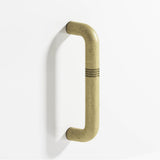 Colonial Bronze - 6'' center-to-center, 6.75'' overall, 0.75'' diameter Grooved wire Cabinet Pull, Door Pull, Shower Door Pull hand finished in Distressed Antique Brass - Distressed Antique Brass