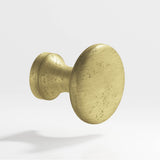 Colonial Bronze - 1.125'' diameter Round Cabinet Knob hand finished in Distressed Antique Brass - Distressed Antique Brass