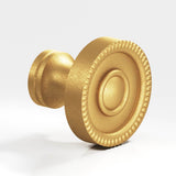 Colonial Bronze - 1.125'' diameter Round, beaded Cabinet Knob hand finished in Weathered Brass - Weathered Brass