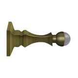 Deltana - 3-1/2'' Baseboard Door Bumper, HD, Solid Brass - Antique Brass