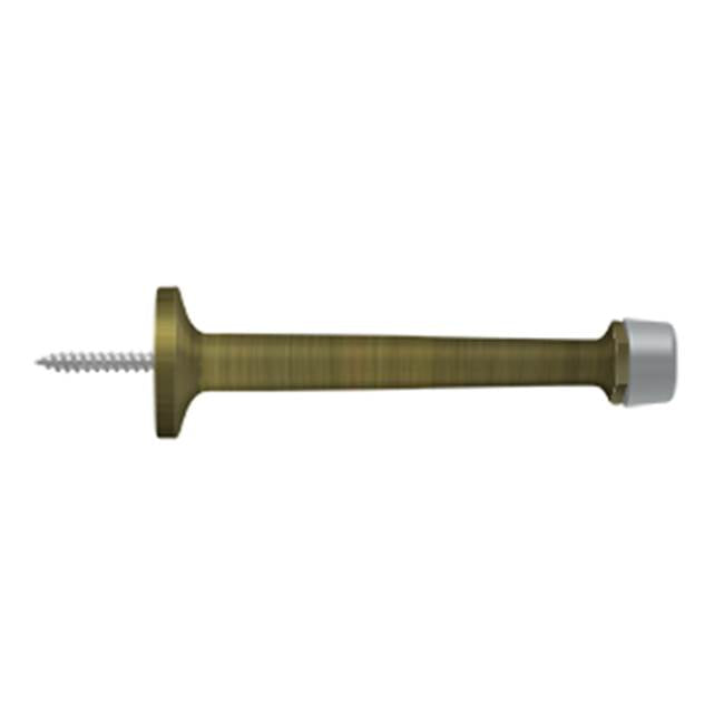 Deltana - 4'' Baseboard Door Bumper, Solid Brass - Antique Brass