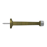 Deltana - 4'' Baseboard Door Bumper, Solid Brass - Antique Brass