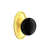 Emtek - Privacy, Oval Rosette, Ebony Knob, US3 Lifetime - Polished Brass
