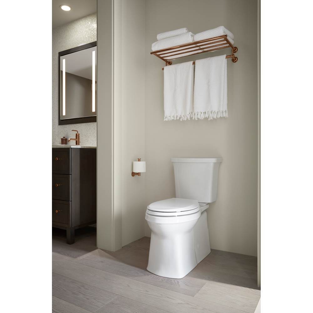 Corbelle Two-piece elongated toilet with skirted trapway, 1.28 gpf