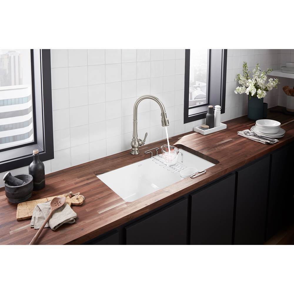 Artifacts Touchless pull-down kitchen sink faucet with three-function sprayhead