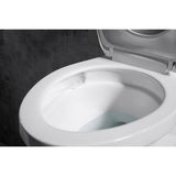 Betello Two-piece elongated toilet with skirted trapway, 1.28 gpf