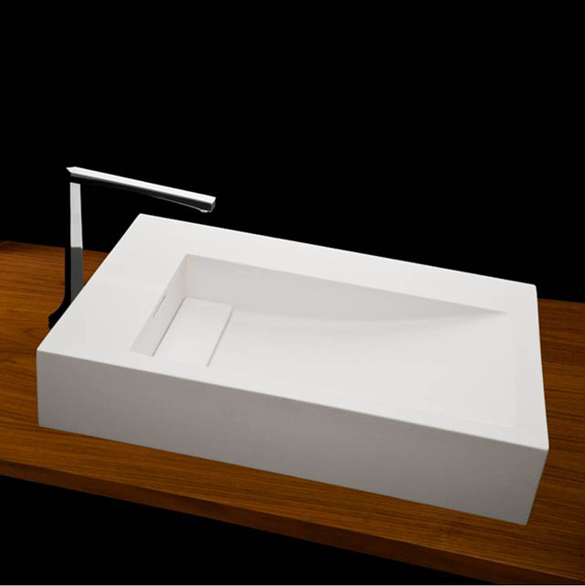 Lacava - Vessel Bathroom Sink with deck on the left, made of solid surface, with an overflow and decorative drain cover. - Matte White