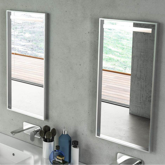 Lacava - Wall-mount mirror in wooden or metal frame with LED light behind sand blasted frosted section on top. W:15'', H:34'', D: 2''. - Powder Coated Brass
