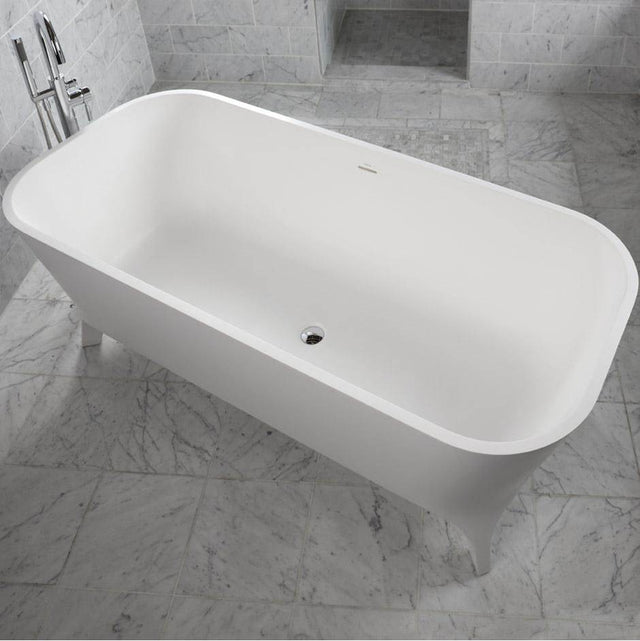 Lacava - Free-standing soaking bathtub made of white solid surface with an overflow and a decorative solid surface drain; net weight 408 lbs - Matte White