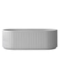 Lacava - Freestanding soaking bathtub with fluted detailing, white solid surface, overflow, and decorative solid surface drain; 353 lbs, 77 gal capacity. Shipping class 5. W67", D30.75", H21.625" - Matte White Solid Surface