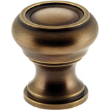 OMNIA - 1 1/4'' Dia Cabinet Knob US5 - Lacquered Antique Brass