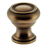 OMNIA - 1 1/2'' Dia Cabinet Knob US5 - Lacquered Antique Brass