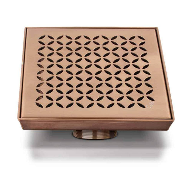 QM Drain - Delmar Series. Lotus Line. 5 3/4'' Square Drain. Bronze fin. - Bronze