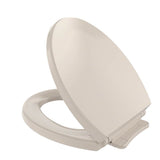 TOTO - TOTO SoftClose Slow Close Round Toilet Seat and Lid, Bone - Bone