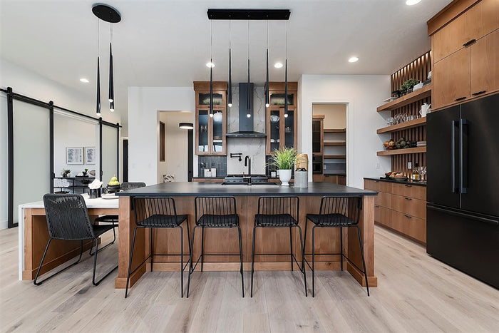 Bosch suite in a navy-and-oak kitchen